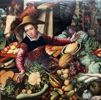 Marktfrau am Gemüstestand